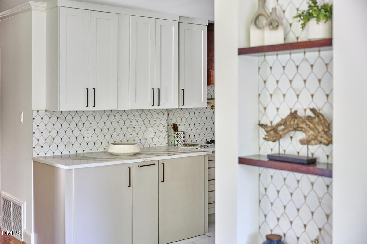 1609 Acadia Street Durham, NC 27701 - Photo 25 of 56 a view of a kitchen with appliances