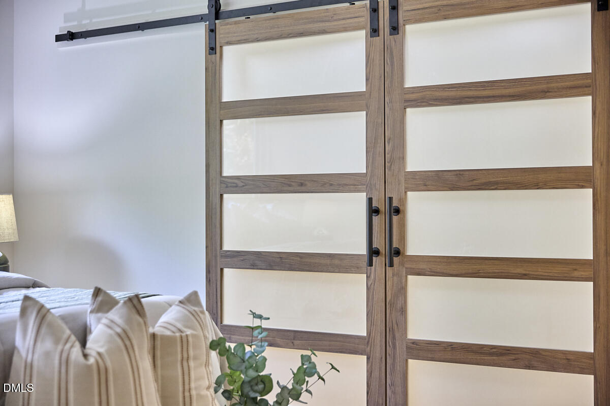 1609 Acadia Street Durham, NC 27701 - Photo 33 of 56 a view of walk in closet with clothes