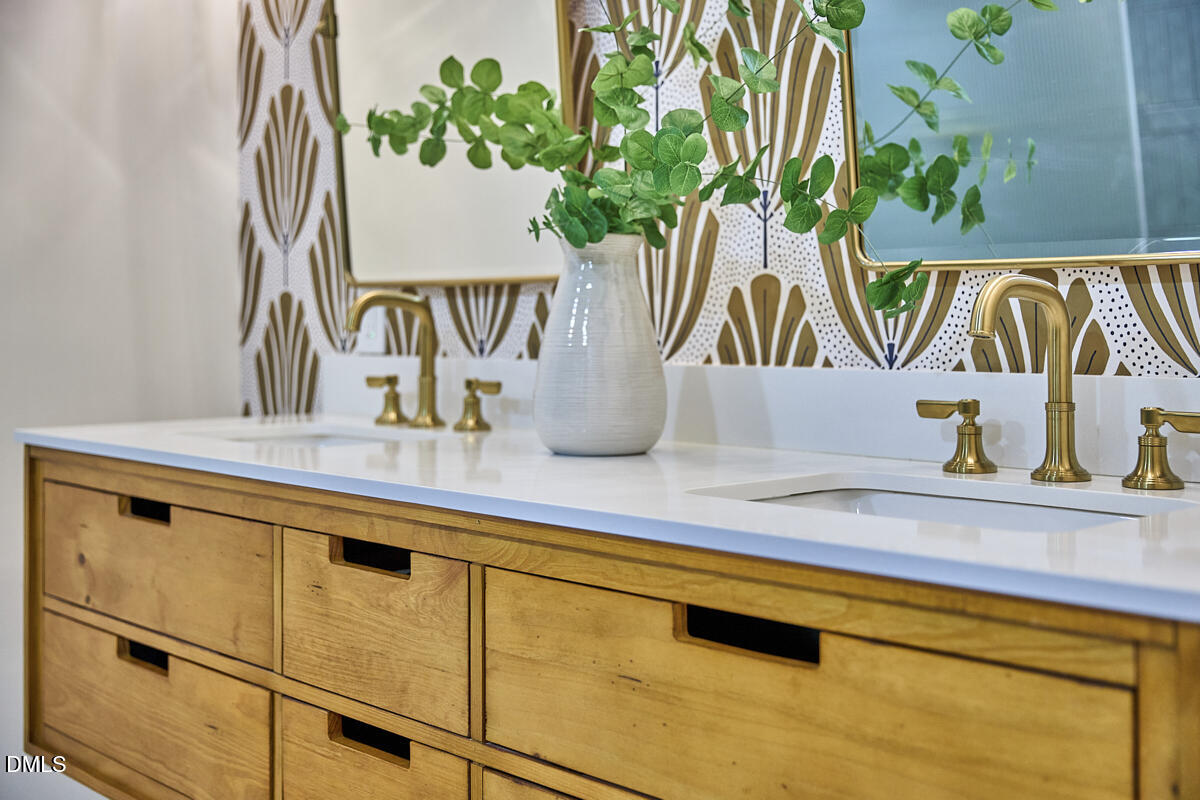 1609 Acadia Street Durham, NC 27701 - Photo 39 of 56 a kitchen with a sink and a potted plant
