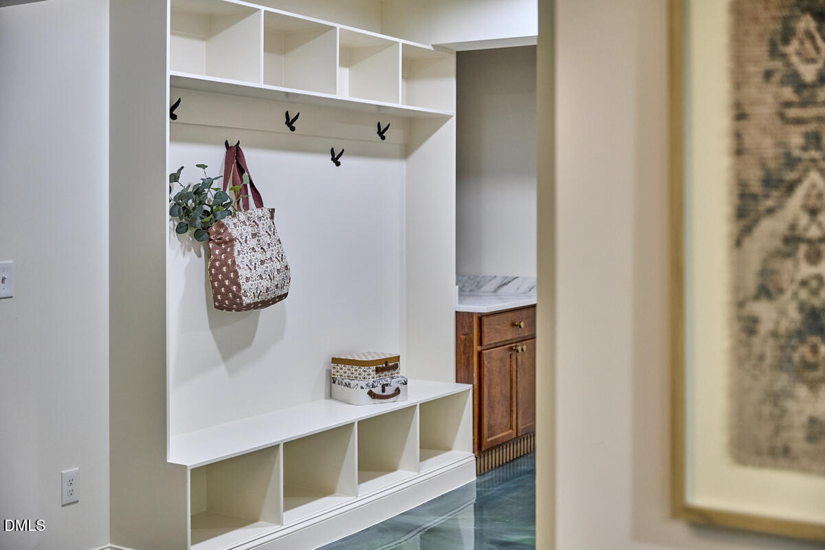 1609 Acadia Street Durham, NC 27701 - Photo 41 of 56 a view of walk in closet with clothes and shoes