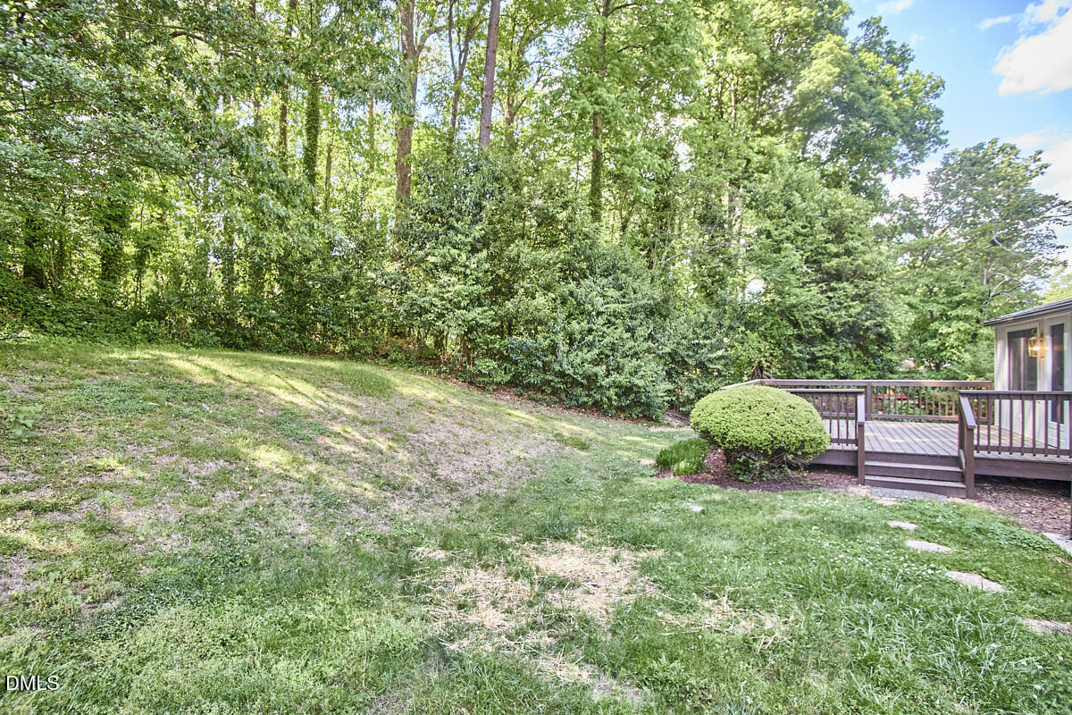 1609 Acadia Street Durham, NC 27701 - Photo 55 of 56 a view of a backyard with a garden
