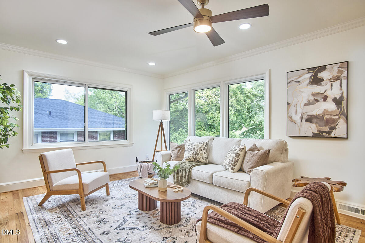 1609 Acadia Street Durham, NC 27701 - Photo 6 of 56 a living room with furniture and a large window