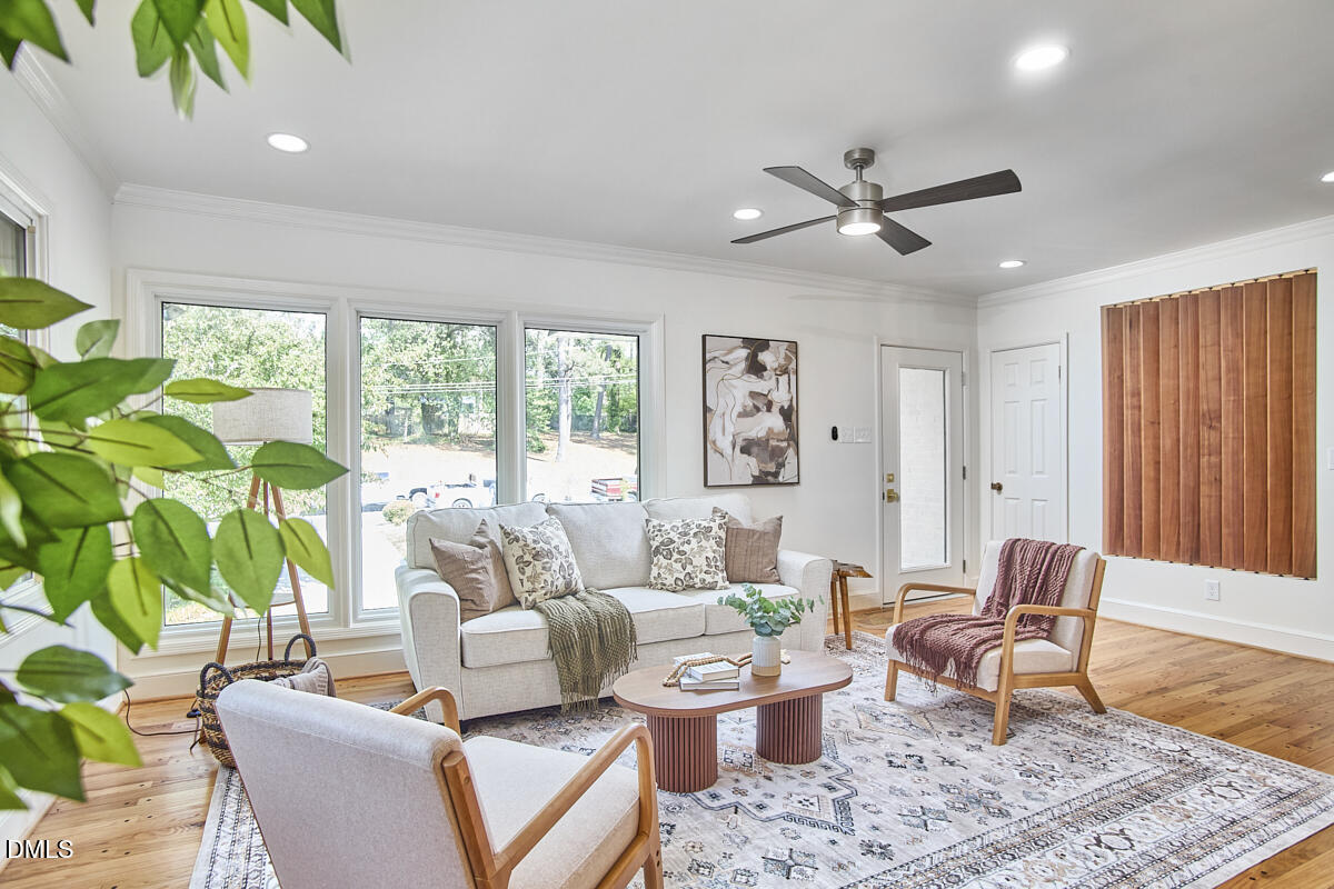 1609 Acadia Street Durham, NC 27701 - Photo 8 of 56 a living room with furniture and a large window