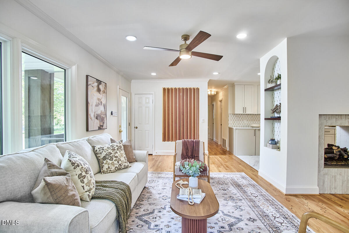 1609 Acadia Street Durham, NC 27701 - Photo 9 of 56 a living room with furniture and a rug