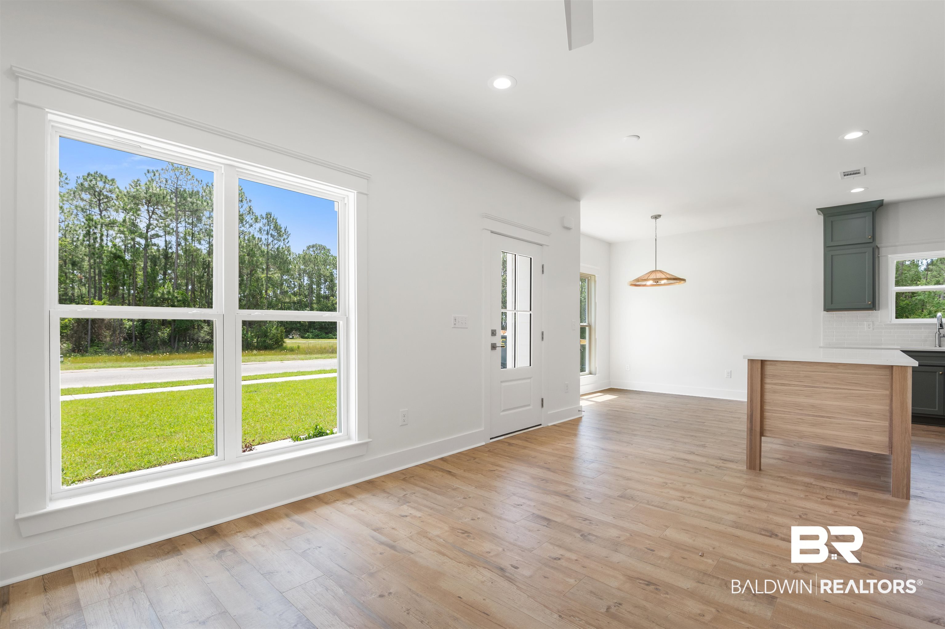 657 Island Way Gulf Shores, AL 36542 - Photo 11 of 59 Foyer entrance with light wood finished floors, baseboards, and recessed lighting