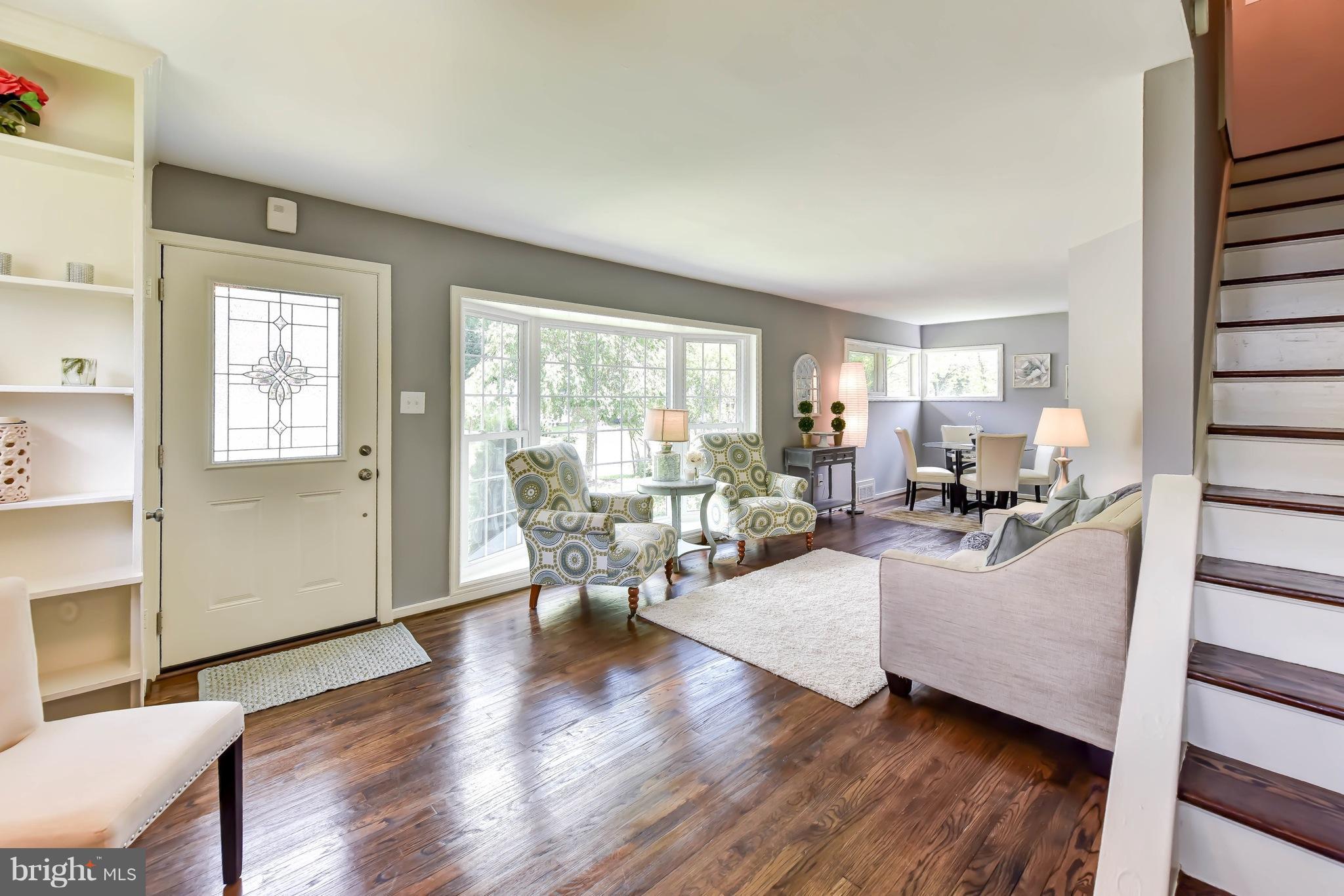 7002 Quander Road Alexandria, VA 22307 - Photo 2 of 23 a living room with furniture and a large window