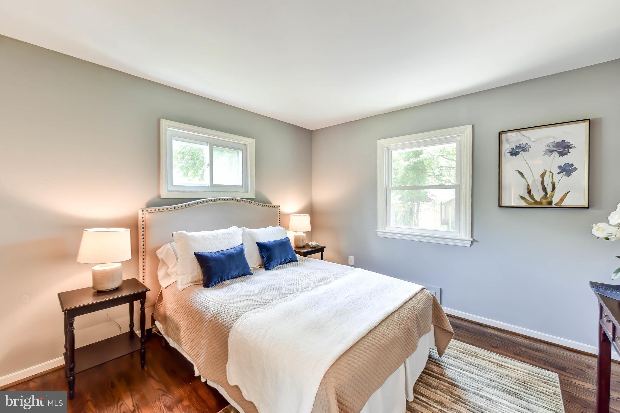 7002 Quander Road Alexandria, VA 22307 - Photo 11 of 23 a bedroom with a bed and a window