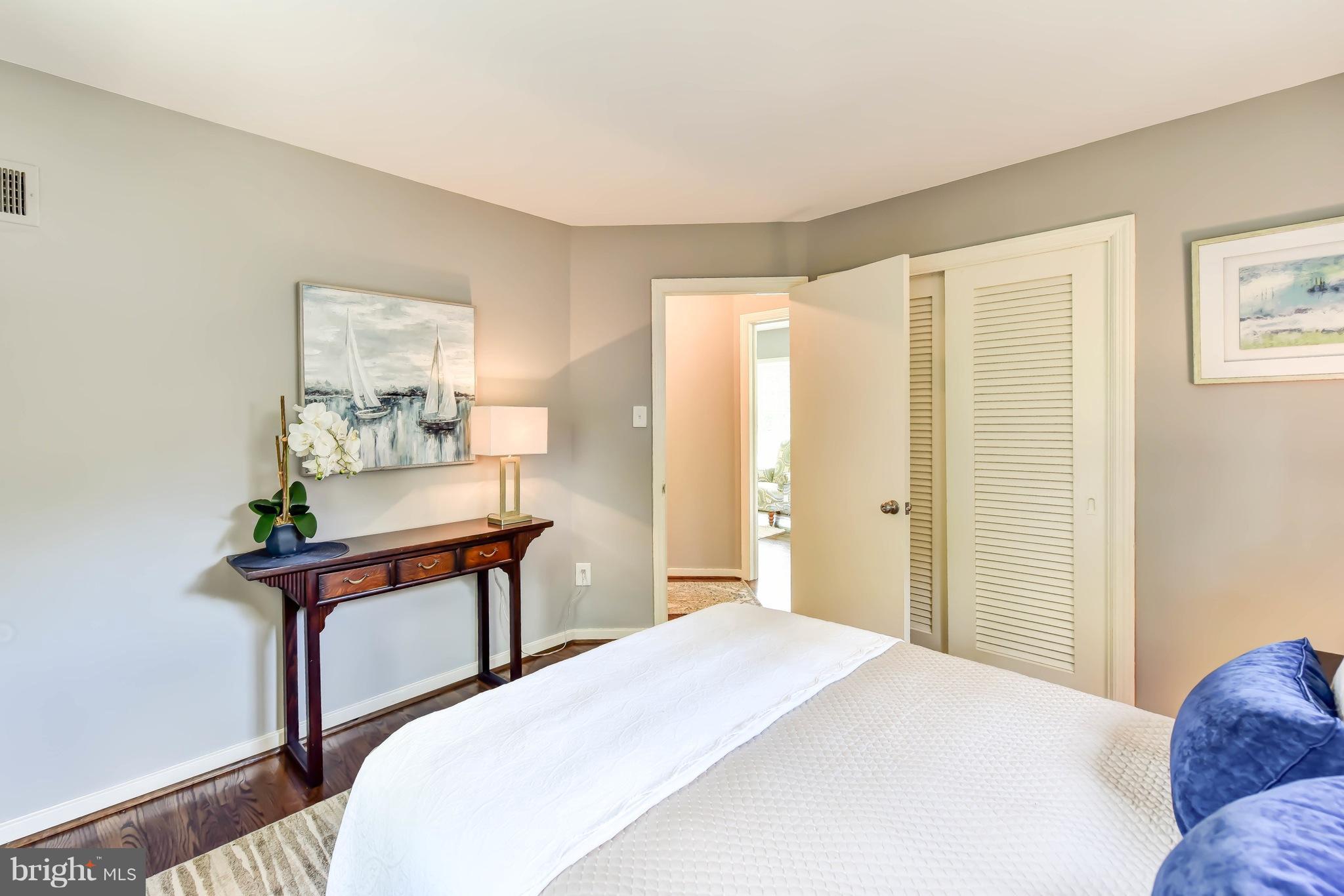 7002 Quander Road Alexandria, VA 22307 - Photo 12 of 23 a bedroom with a bed table and chair