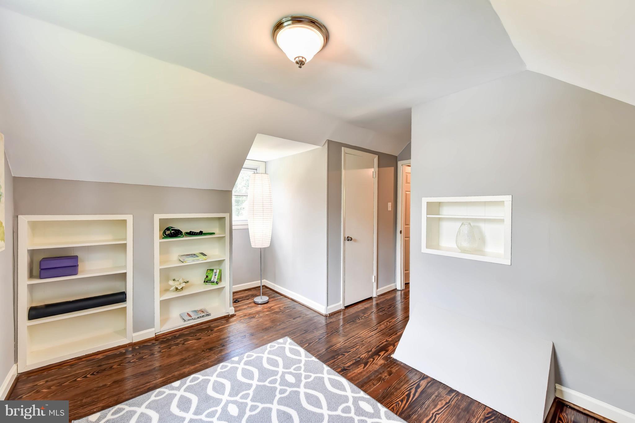 7002 Quander Road Alexandria, VA 22307 - Photo 15 of 23 a view of a bedroom with furniture and closet