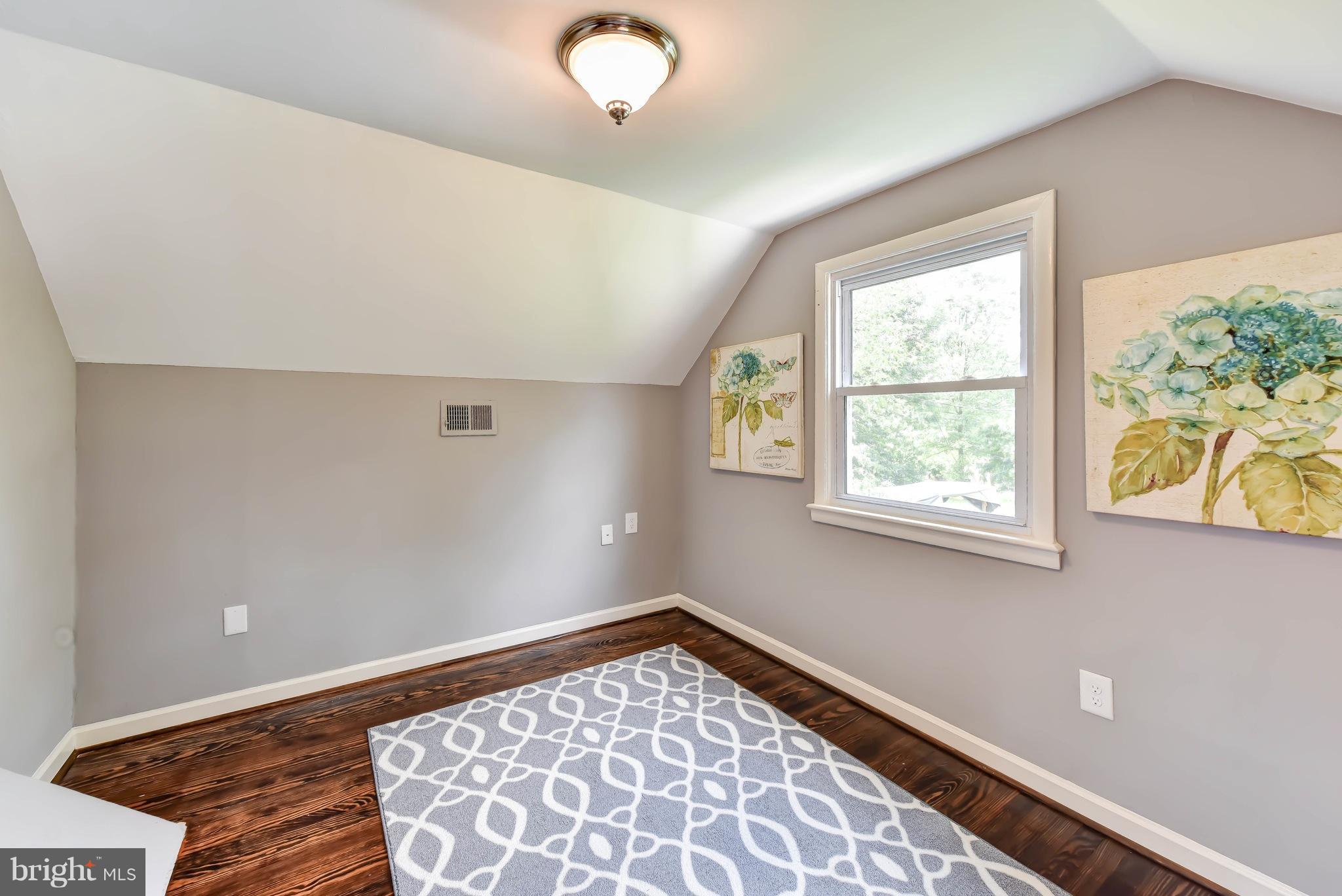 7002 Quander Road Alexandria, VA 22307 - Photo 16 of 23 a view of an empty room with a window