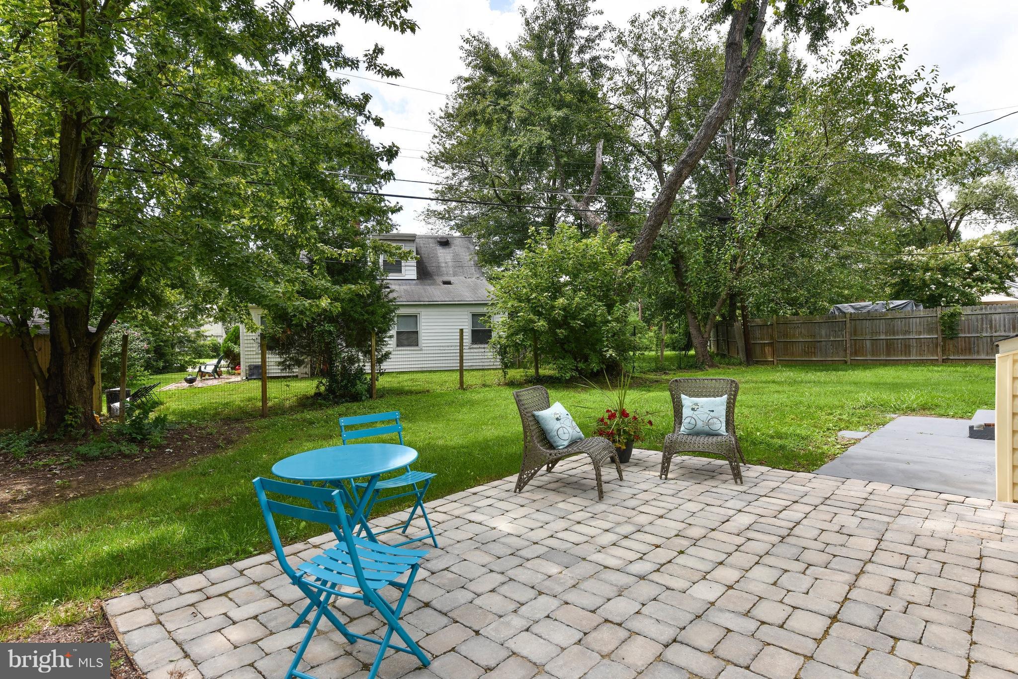7002 Quander Road Alexandria, VA 22307 - Photo 20 of 23 a view of a table and chairs in the garden