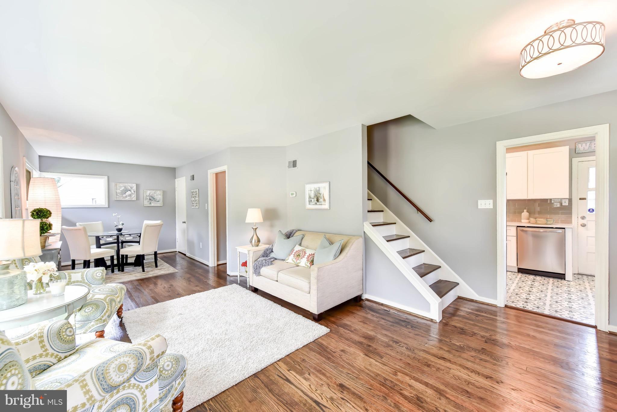 7002 Quander Road Alexandria, VA 22307 - Photo 3 of 23 a living room with furniture and wooden floor