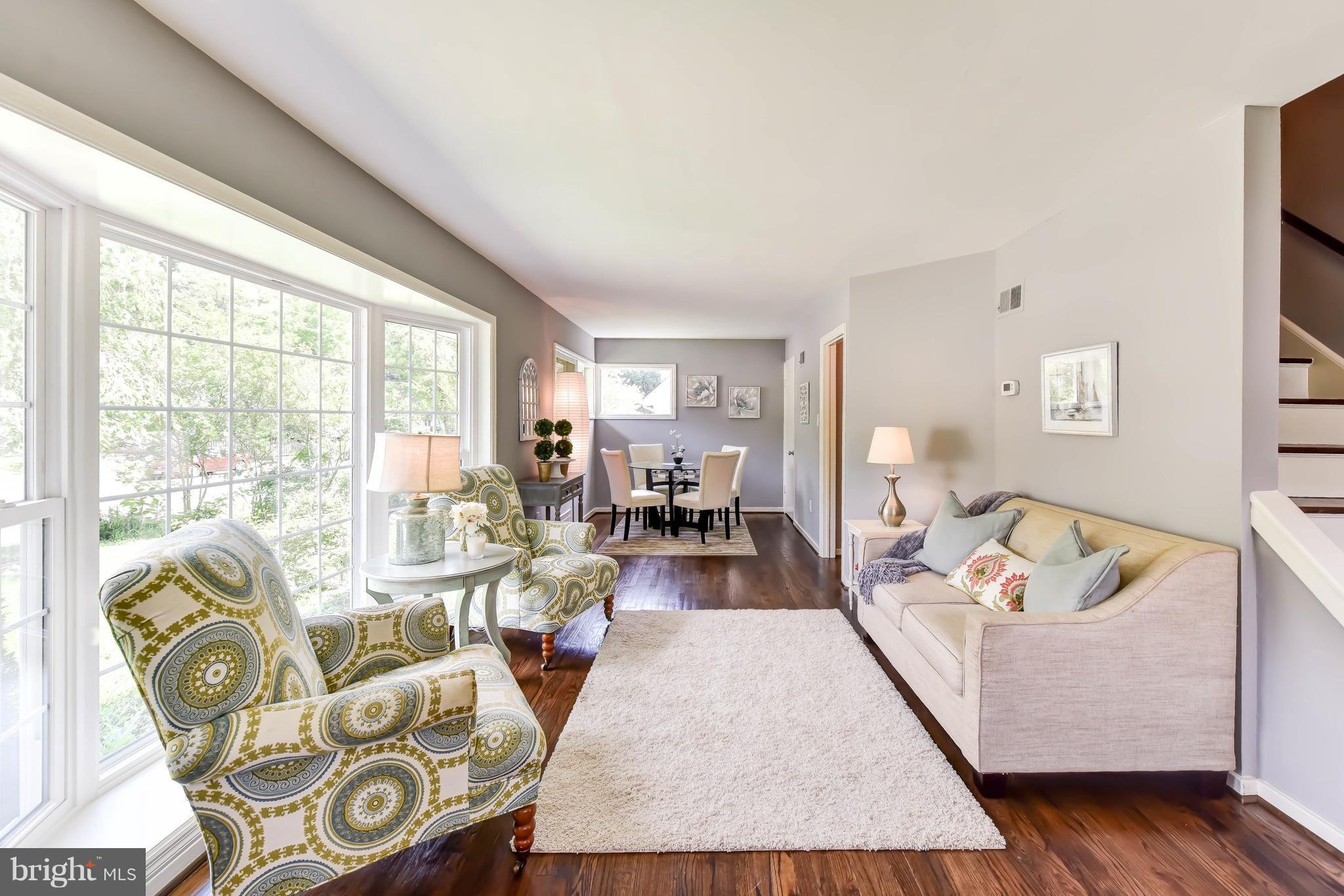 7002 Quander Road Alexandria, VA 22307 - Photo 4 of 23 a living room with furniture and a large window
