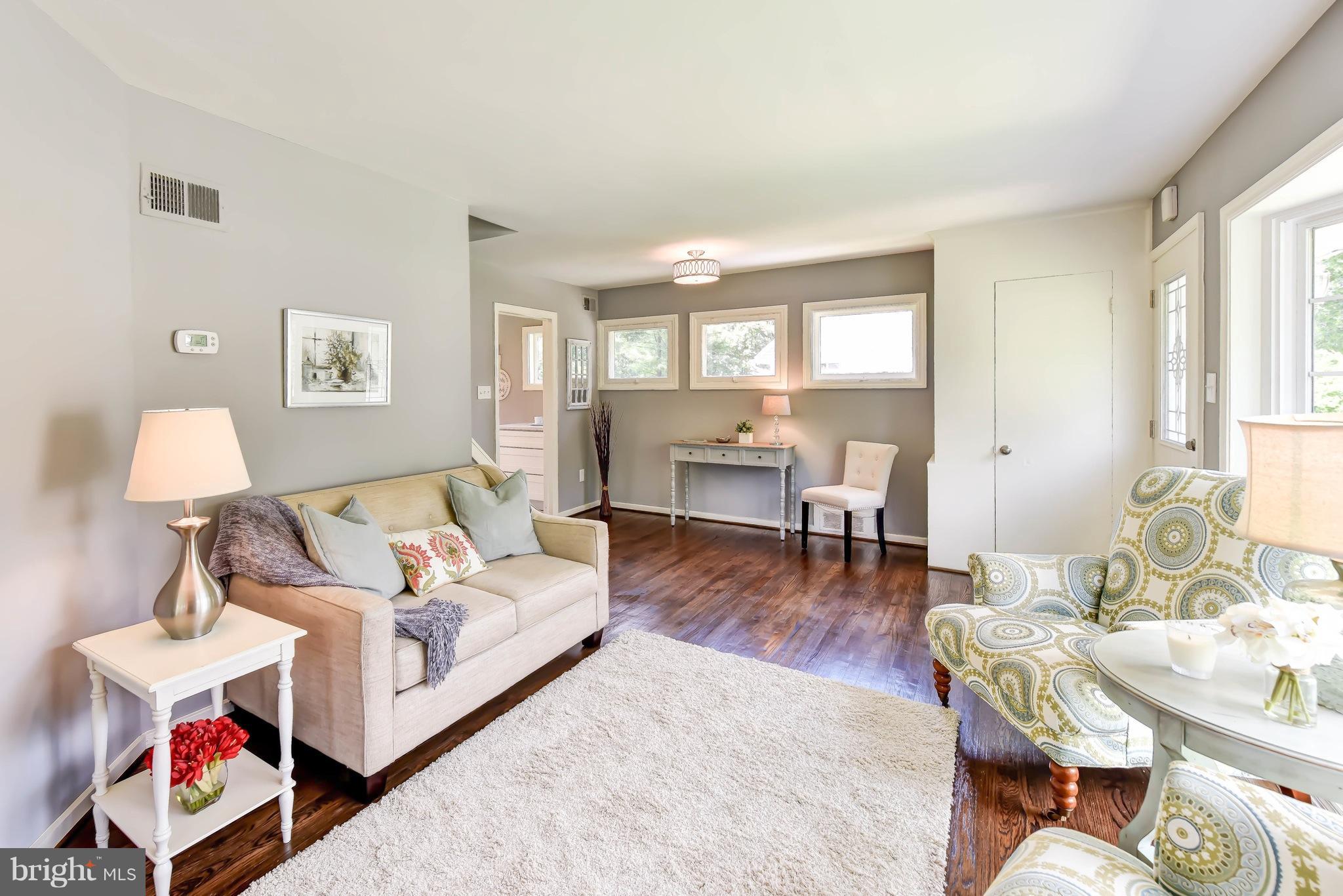 7002 Quander Road Alexandria, VA 22307 - Photo 5 of 23 a living room with furniture and a wooden floor