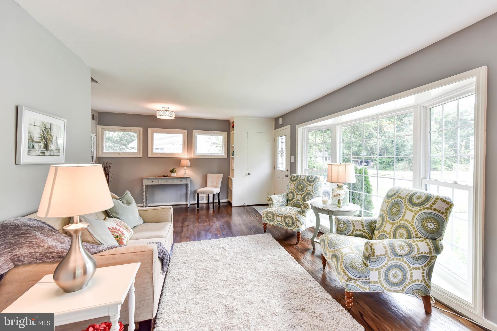 7002 Quander Road Alexandria, VA 22307 - Photo 6 of 23 a living room with furniture and a large window