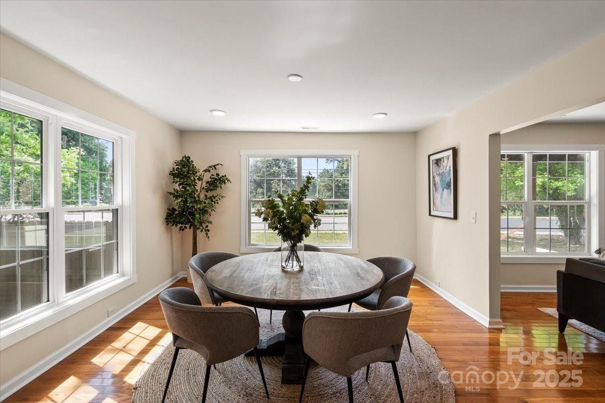6034 Tuckaseegee Road Charlotte, NC 28208 - Photo 12 of 35 a dining room with furniture and window