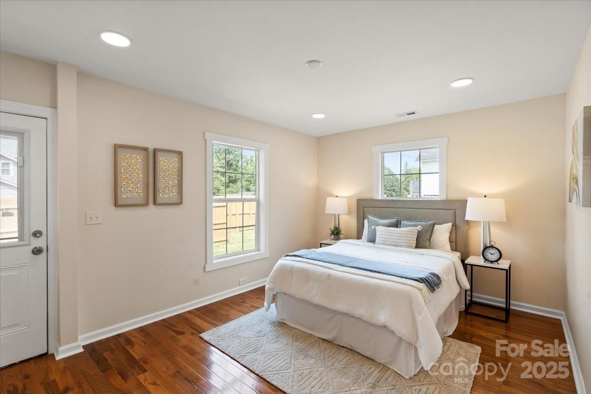 6034 Tuckaseegee Road Charlotte, NC 28208 - Photo 18 of 35 a bedroom with a bed and a window