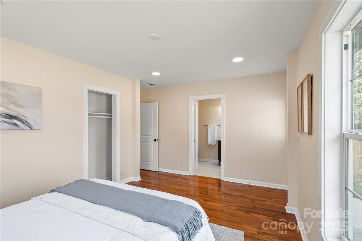 6034 Tuckaseegee Road Charlotte, NC 28208 - Photo 20 of 35 a bedroom with a bed and a window