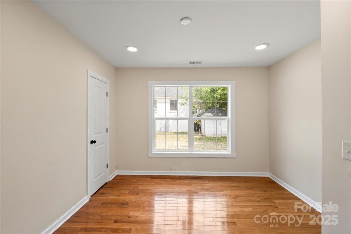 6034 Tuckaseegee Road Charlotte, NC 28208 - Photo 24 of 35 a view of an empty room with a window