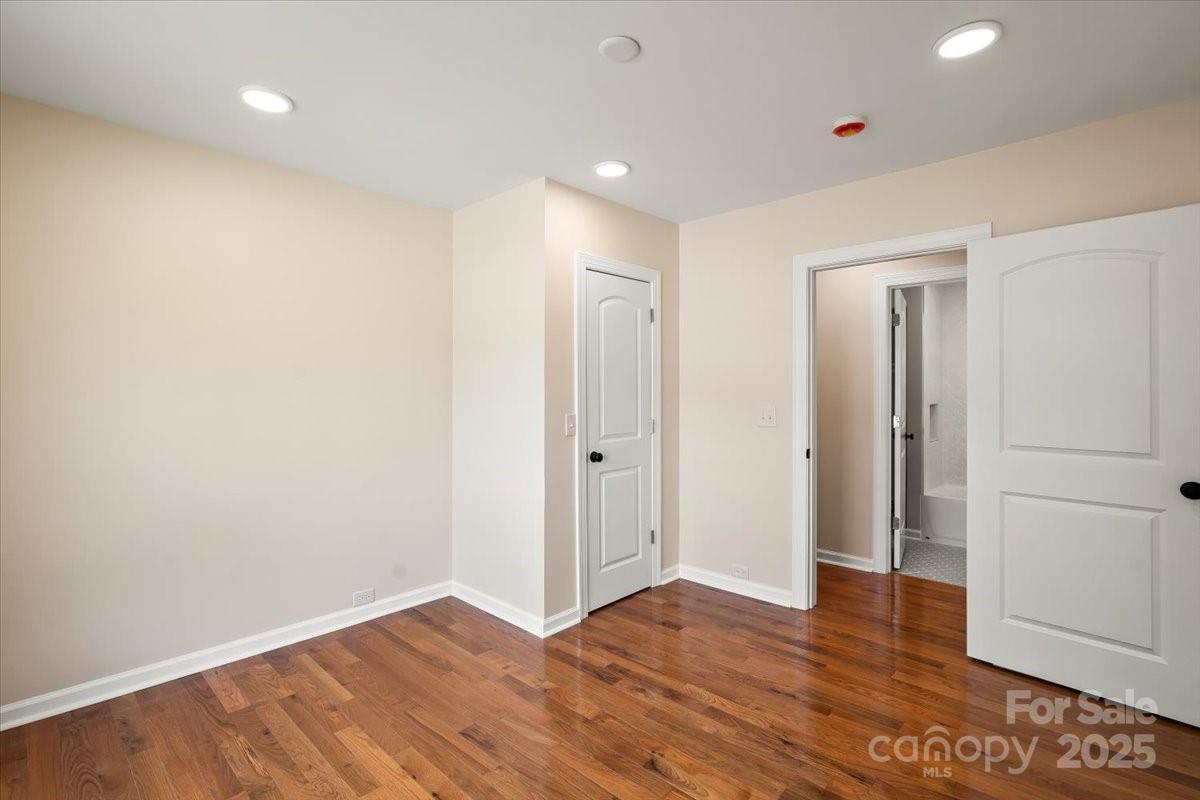 6034 Tuckaseegee Road Charlotte, NC 28208 - Photo 25 of 35 a view of hallway with wooden floor