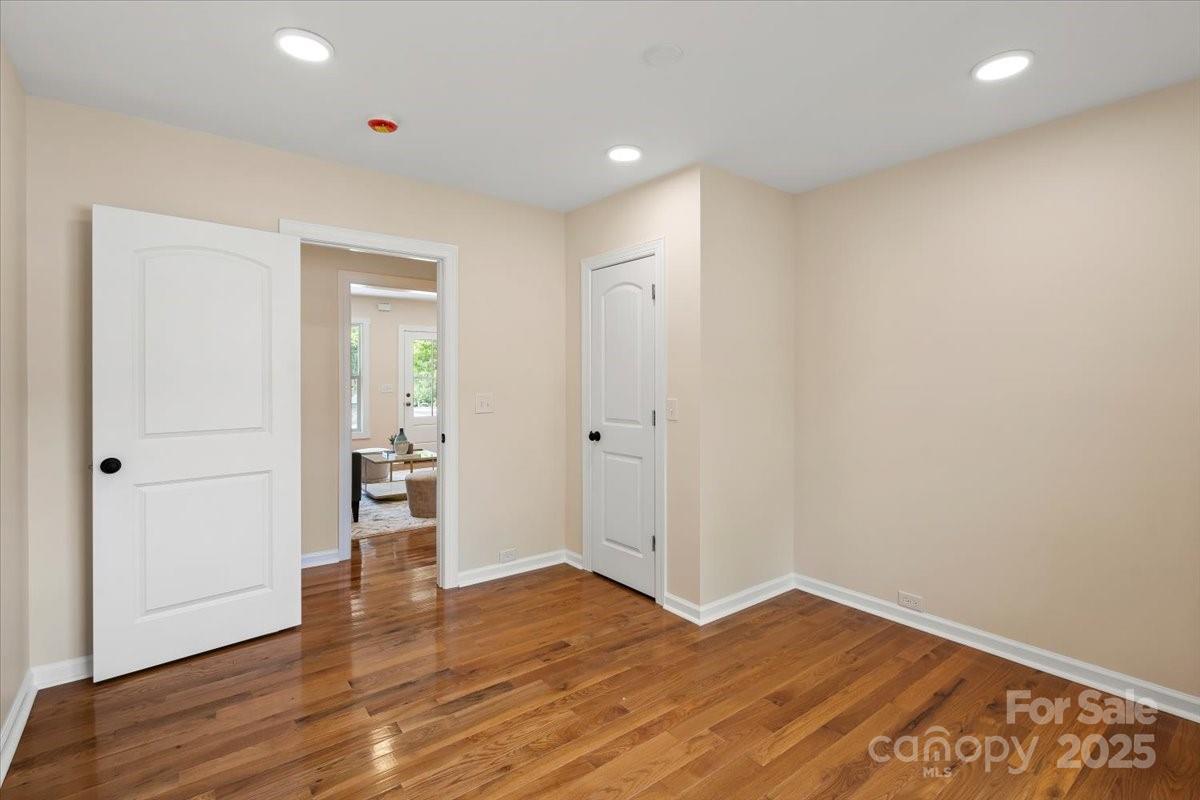 6034 Tuckaseegee Road Charlotte, NC 28208 - Photo 27 of 35 a view of empty room with wooden floor