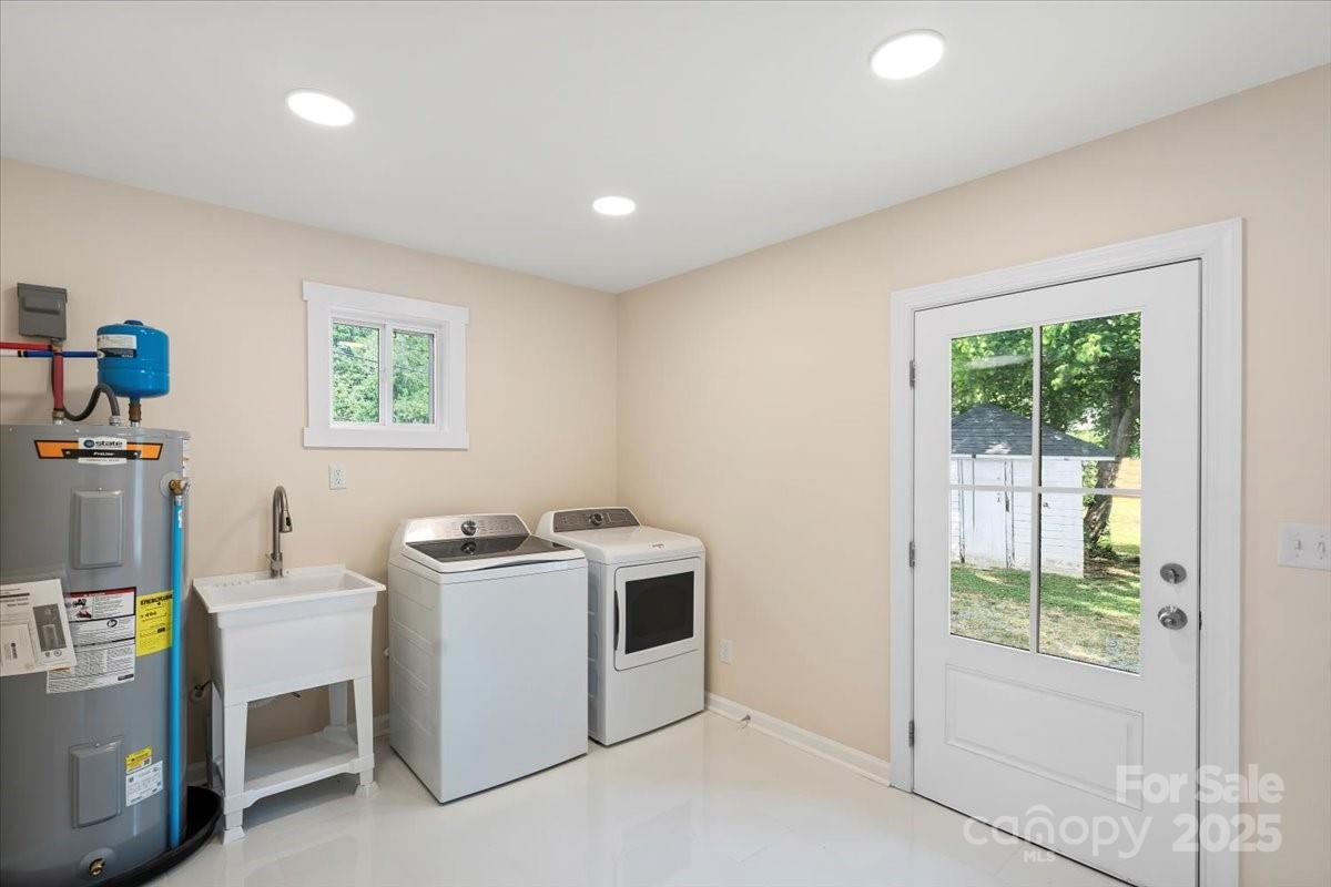 6034 Tuckaseegee Road Charlotte, NC 28208 - Photo 29 of 35 a room with storage and utility