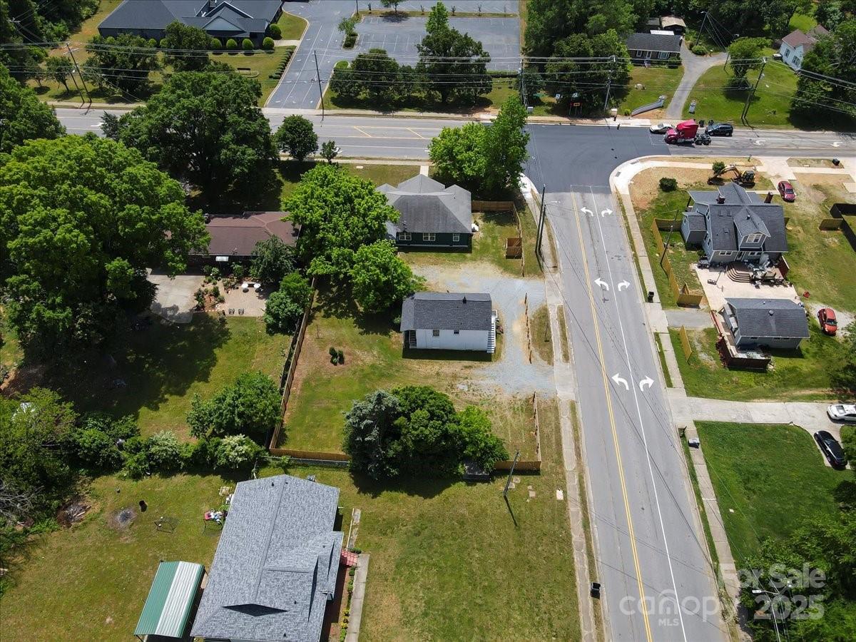 6034 Tuckaseegee Road Charlotte, NC 28208 - Photo 34 of 35 an aerial view of a house with outdoor space