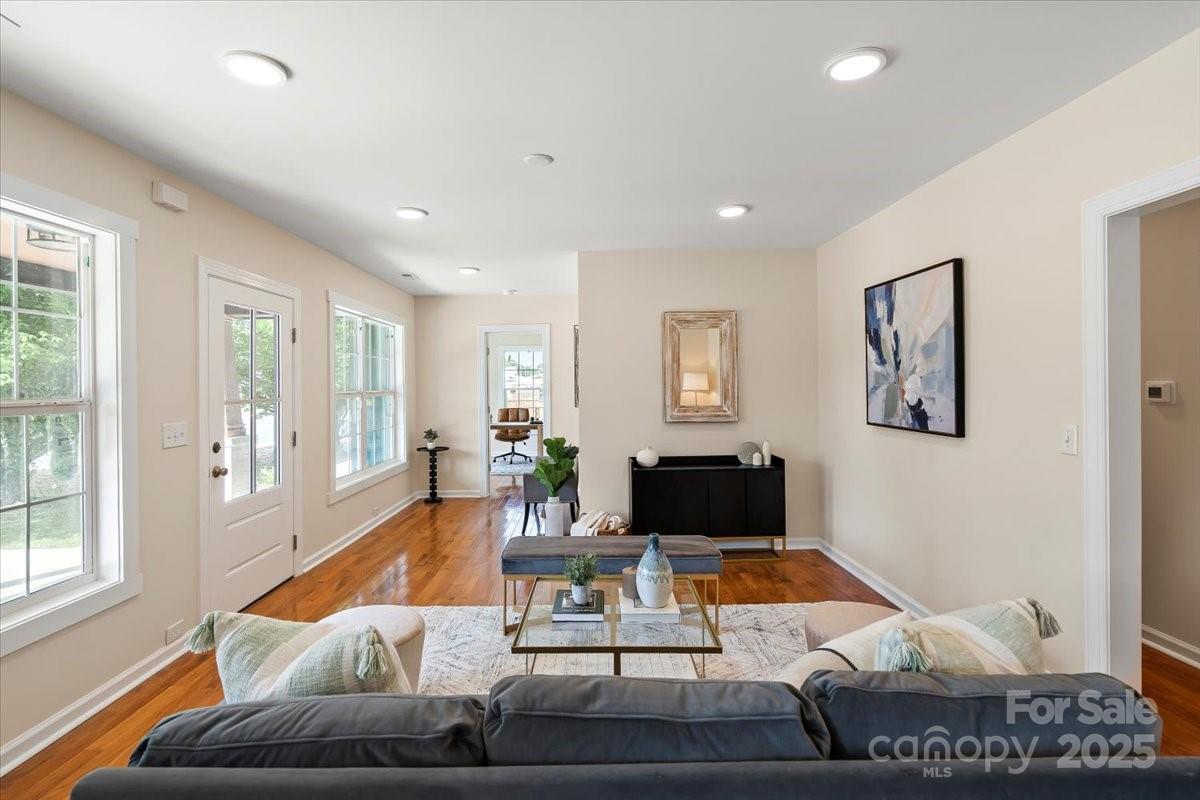 6034 Tuckaseegee Road Charlotte, NC 28208 - Photo 5 of 35 a living room with furniture and a flat screen tv