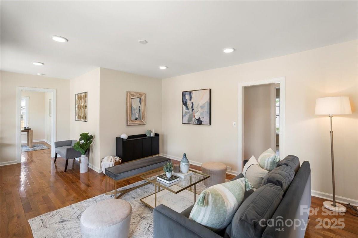6034 Tuckaseegee Road Charlotte, NC 28208 - Photo 7 of 35 a living room with furniture and wooden floor