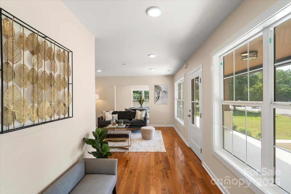 6034 Tuckaseegee Road Charlotte, NC 28208 - Photo 8 of 35 a view of a living room and a large window