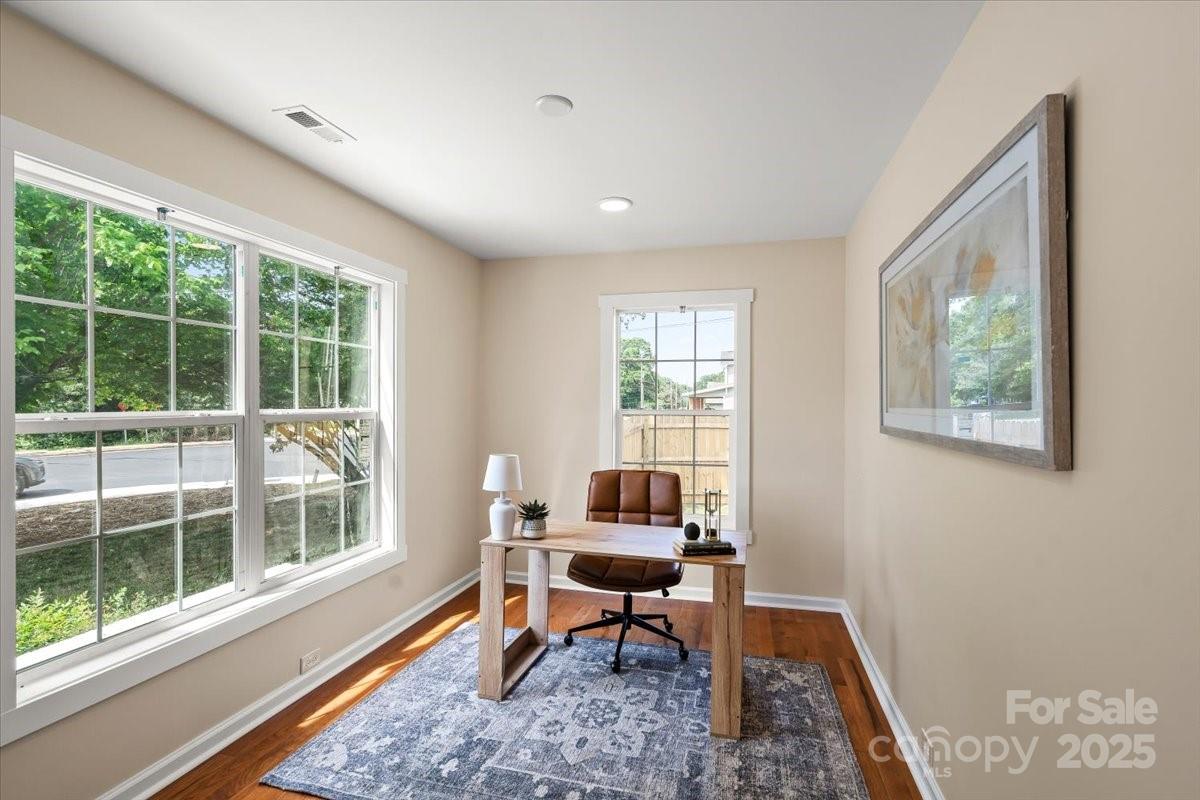 6034 Tuckaseegee Road Charlotte, NC 28208 - Photo 9 of 35 a living room with furniture and a window