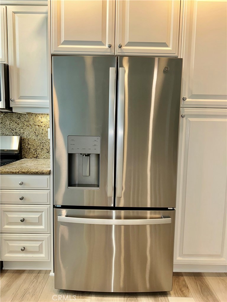 21 Durlston Way Ladera Ranch, CA 92694 - Photo 16 of 47 a view of a refrigerator in kitchen