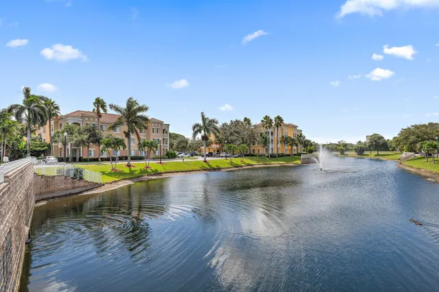 a view of swimming pool with outdoor seating and yard