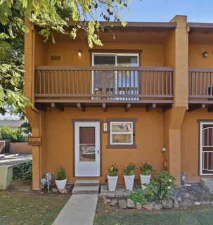 a view of a house with a patio