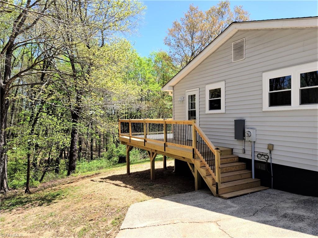 1332 Gentry Farm Road King, NC 27021 - Photo 17 of 24 Left Side of House neighboring lot