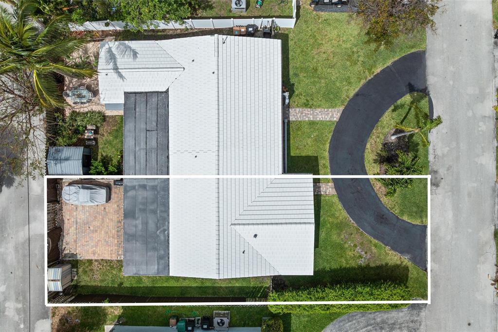 2242 Northeast 37th Street Lighthouse Point, FL 33064 - Photo 12 of 22 a view of a garden