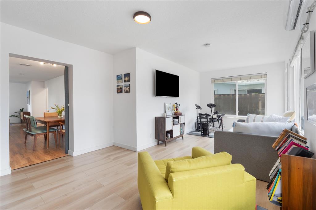 2242 Northeast 37th Street Lighthouse Point, FL 33064 - Photo 18 of 22 a living room with furniture and a flat screen tv