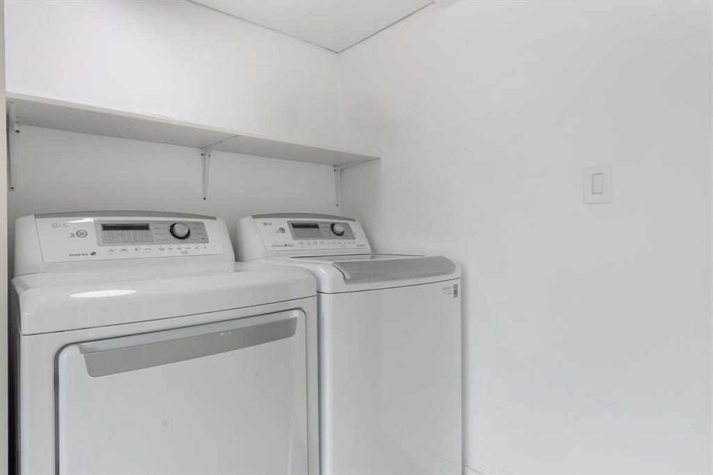 2242 Northeast 37th Street Lighthouse Point, FL 33064 - Photo 19 of 22 a utility room with dryer and washer