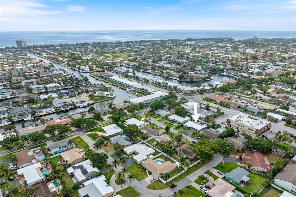 2242 Northeast 37th Street Lighthouse Point, FL 33064 - Photo 2 of 22 an aerial view of residential building with parking space