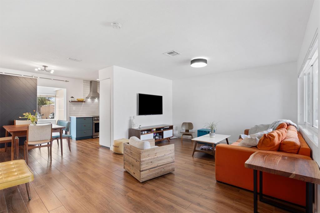 2242 Northeast 37th Street Lighthouse Point, FL 33064 - Photo 3 of 22 a living room with furniture and a flat screen tv