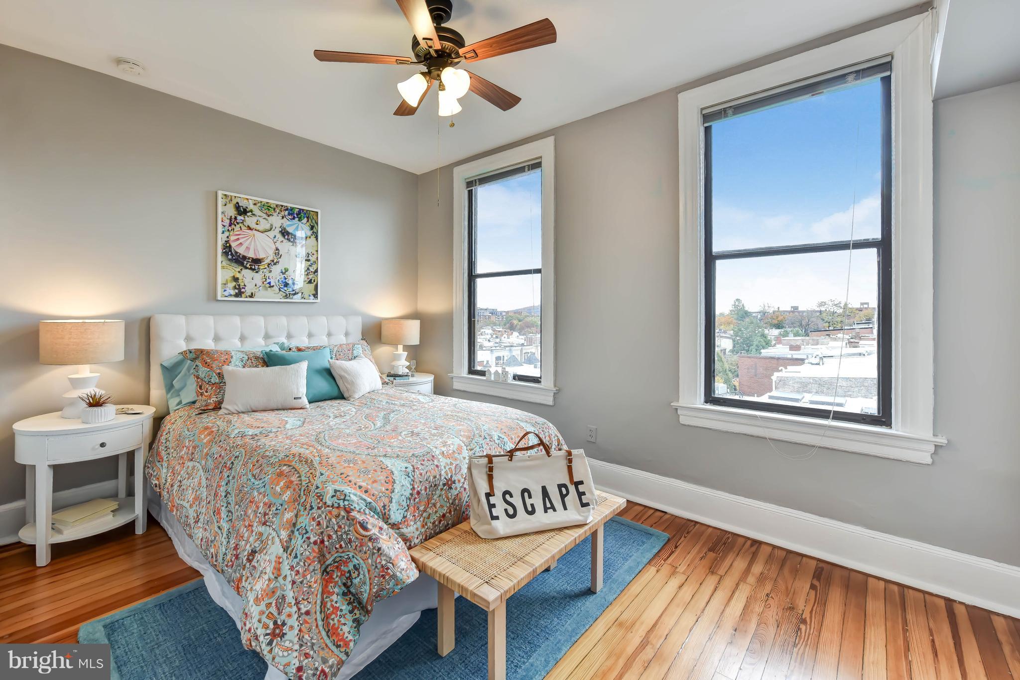 520 E Street Northeast, Unit 401 Washington, DC 20002 - Photo 11 of 23 a bedroom with a bed and a window