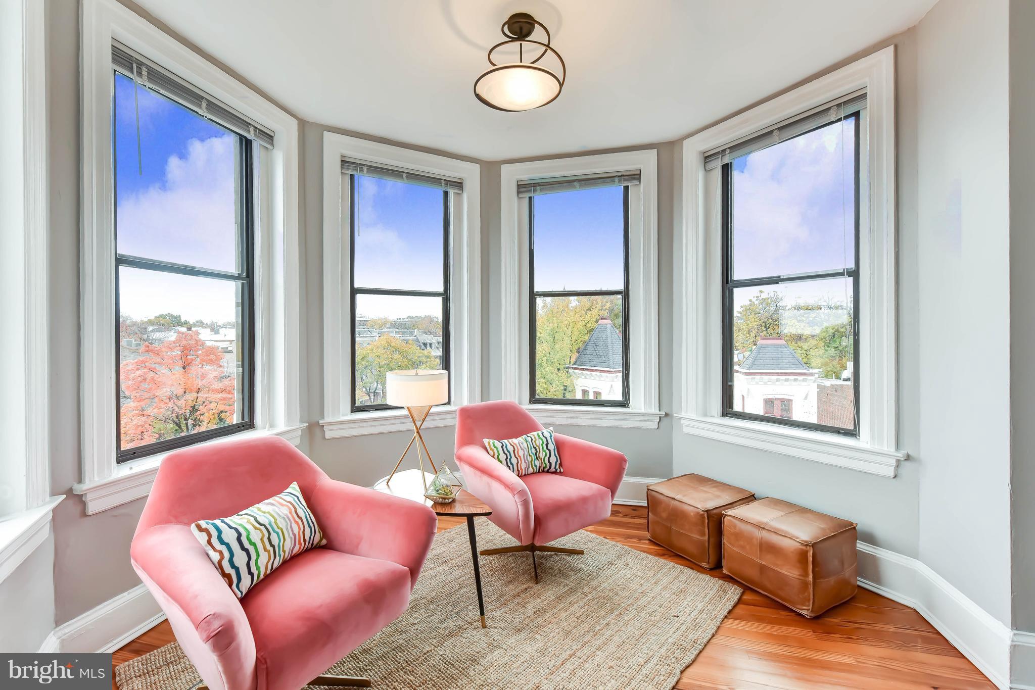 520 E Street Northeast, Unit 401 Washington, DC 20002 - Photo 3 of 23 a living room with furniture and a window