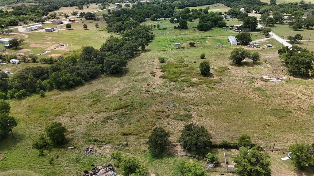 497 Big Sandy Road Newcastle, TX 76372 - Photo 12 of 22 Expansive undeveloped land with varied natural ground cover and scattered mature trees