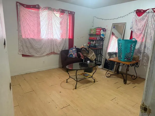 a workspace with furniture and a window