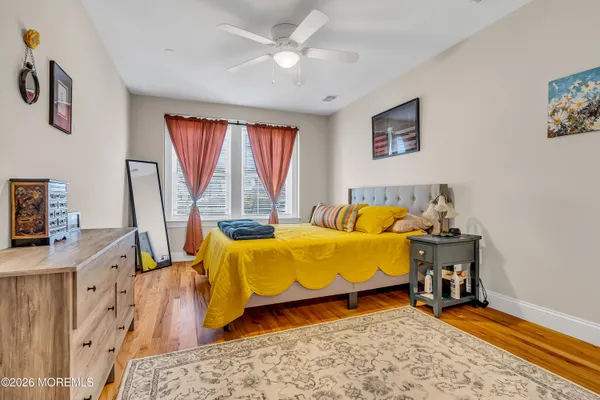 a bed room with a bed and a window