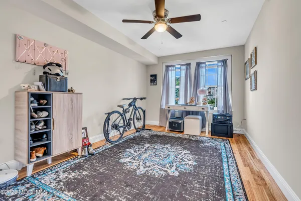 a view of a livingroom with furniture and toys