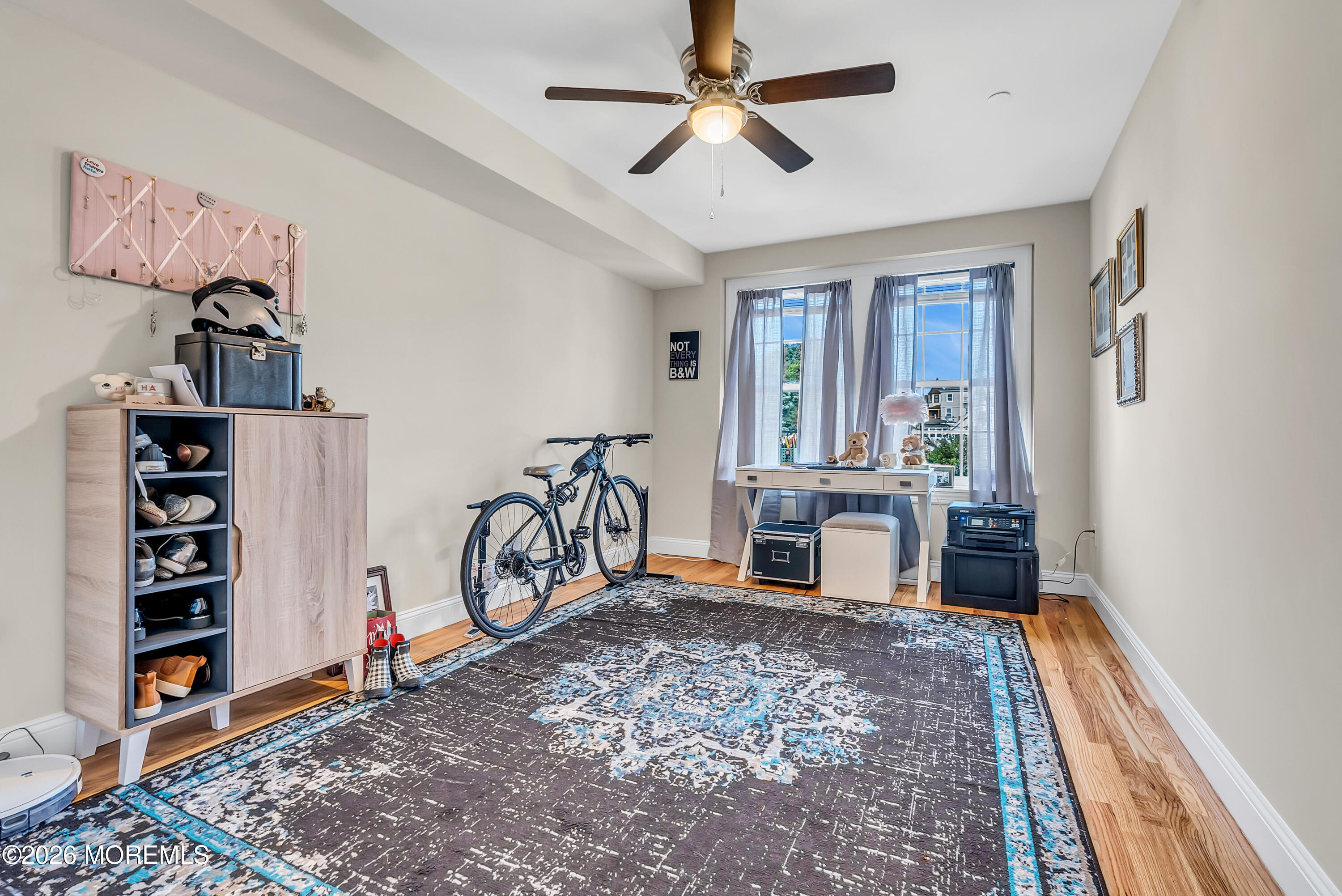 48 First Avenue, Unit 302 Atlantic Highlands, NJ 07716 - Photo 6 of 9 a view of a livingroom with furniture and toys
