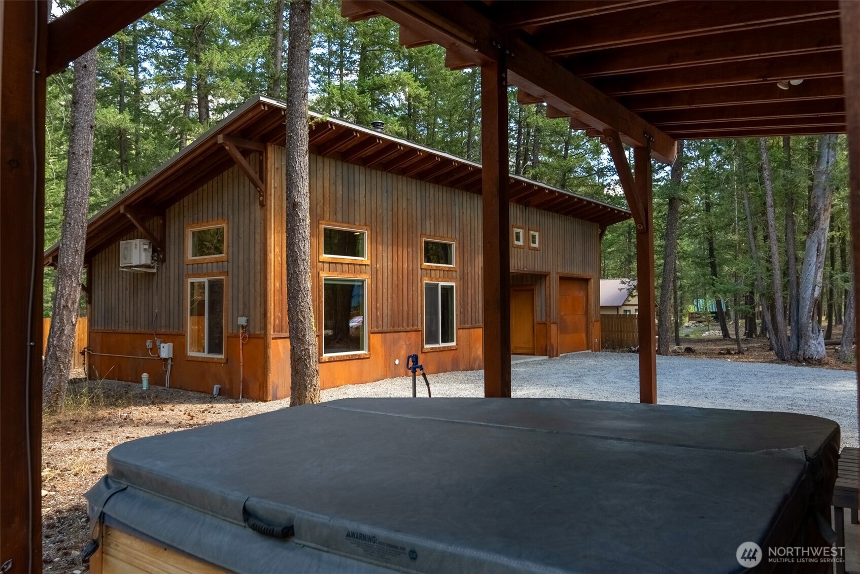 16 Littell Road Mazama, WA 98833 - Photo 18 of 40 a backyard of a house with seating space