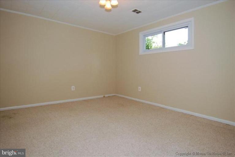 10024 Renfrew Road Silver Spring, MD 20901 - Photo 12 of 25 Lower level bedroom
