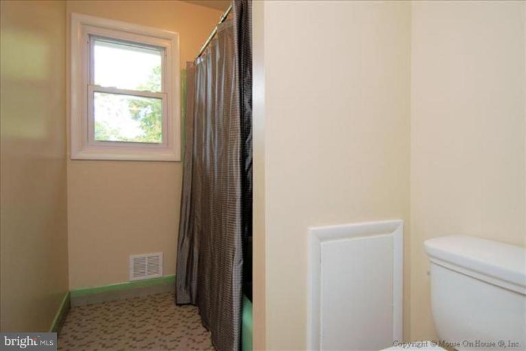 10024 Renfrew Road Silver Spring, MD 20901 - Photo 19 of 25 Main level hall bathroom